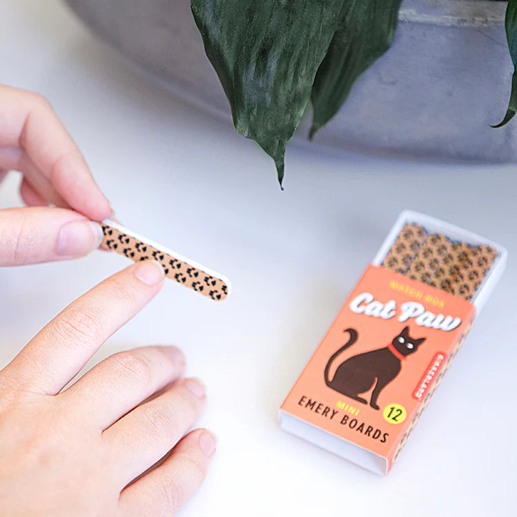 Hand using a Cat Paw emery board