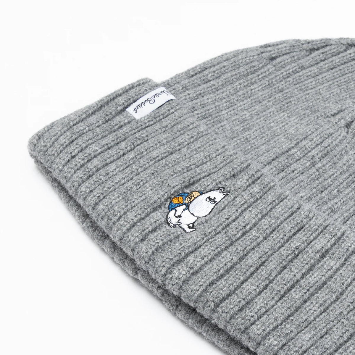 Close-up of the embroidered Moomintroll