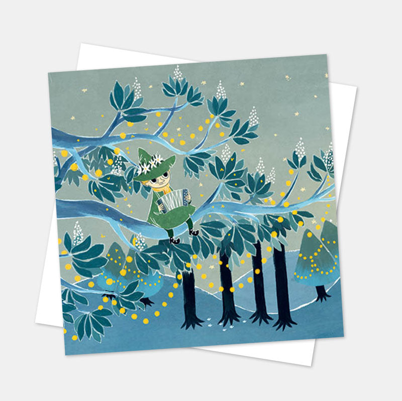 Moomin card of Snufkin sitting in a tree strung with lights