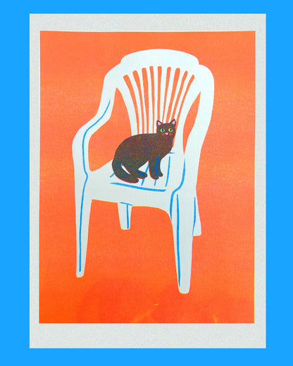 Naomi Wilkinson A4 print: a black cat sitting on a white plastic garden chair on orange