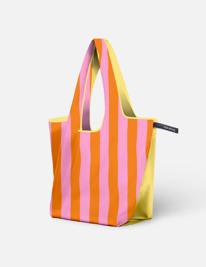 Striped Notabag tote from the side, showing the yellow lining