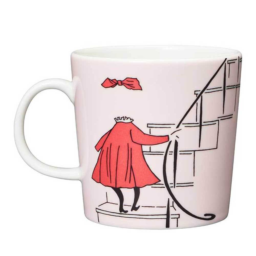Moomin Ninny mug: invisible Ninny in a red dress and bow climbing stairs, on pale pink