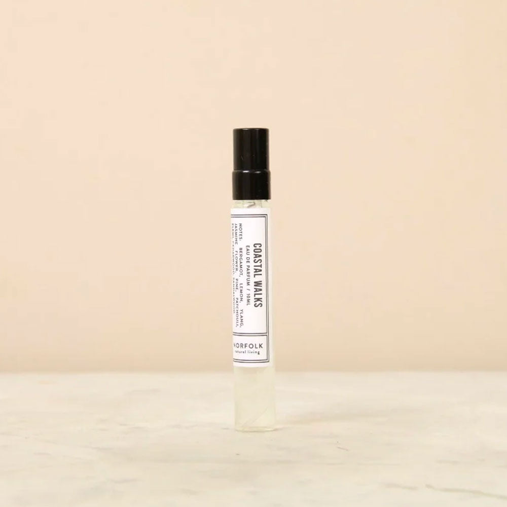 Coastal Walks eau de parfum spray bottle standing on a marble surface
