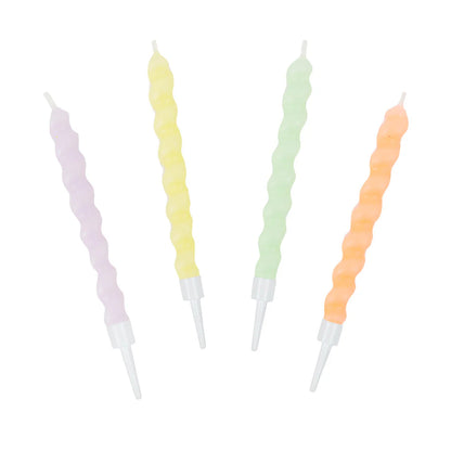 Four spiral birthday candles in lilac, yellow, green and peach