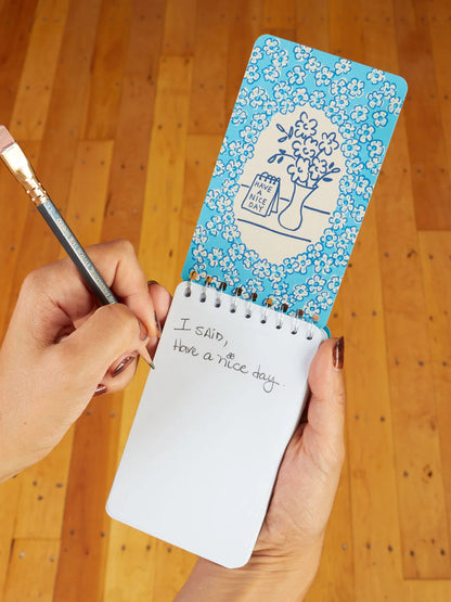 Hand writing in the Angry Woman Essays notebook