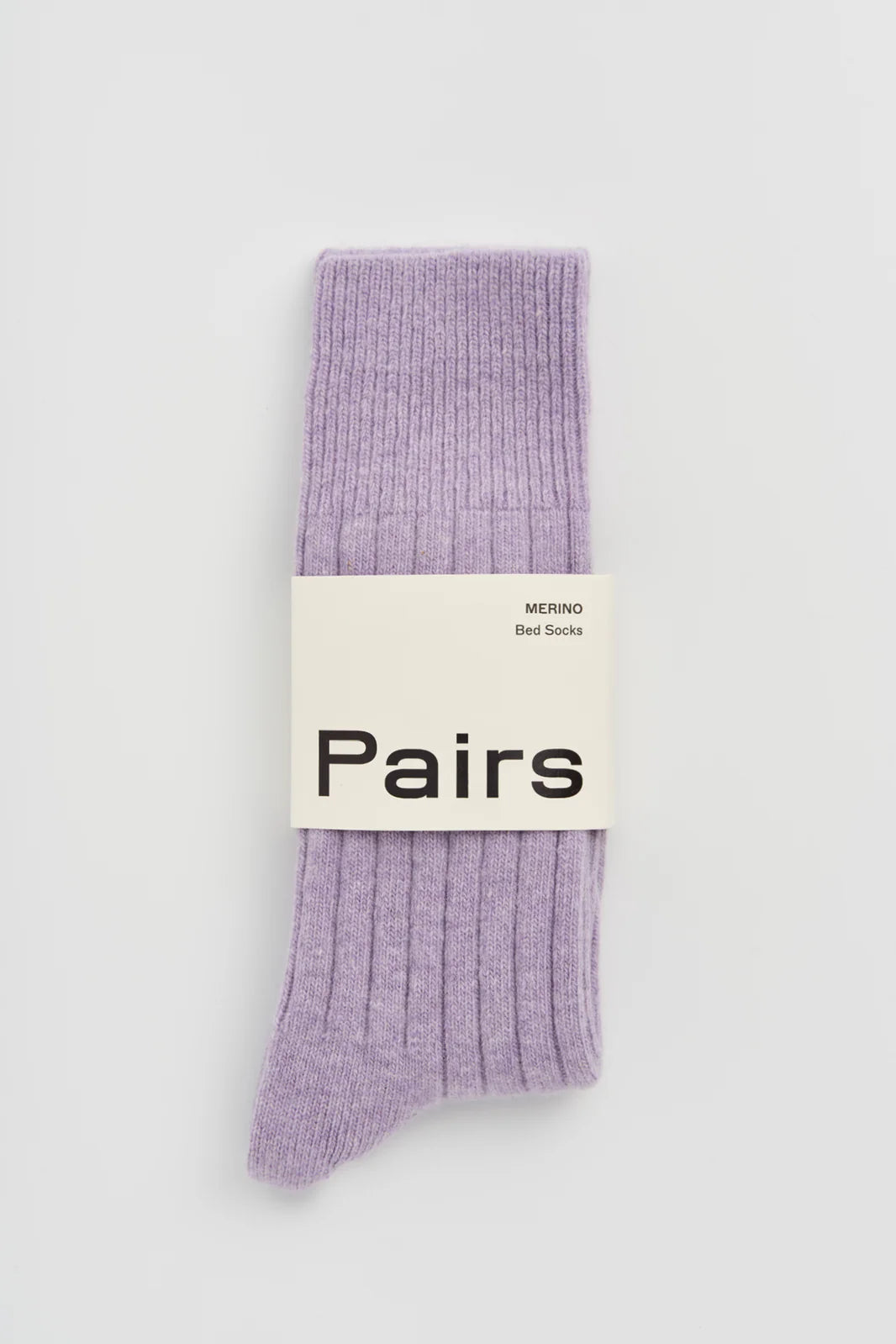 Pairs merino bed socks in parma violet, ribbed, with a Pairs paper band