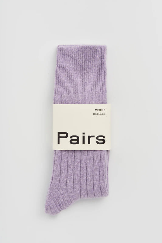 Pairs merino bed socks in parma violet, ribbed, with a Pairs paper band