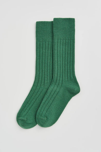 Pair of village green ribbed bed socks laid flat