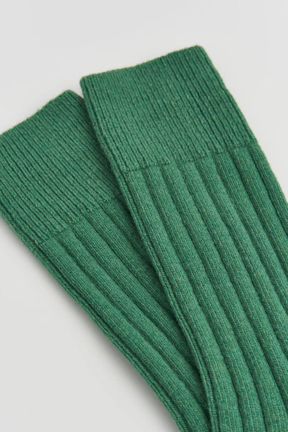 Close-up of the ribbed village green merino knit