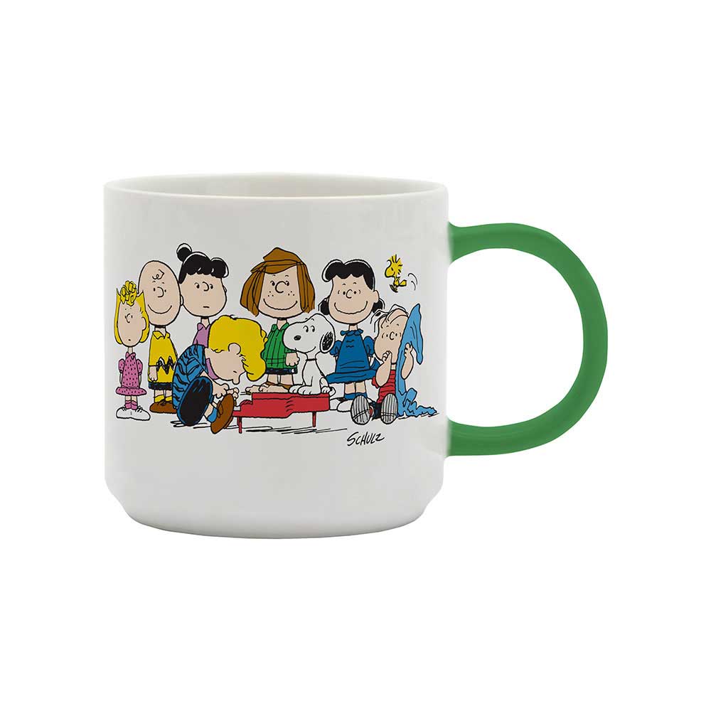 White mug with a green handle and the Peanuts gang