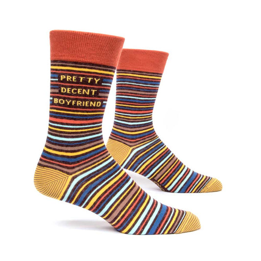 Men's socks in multicoloured stripes with 'Pretty decent boyfriend', on a leg form