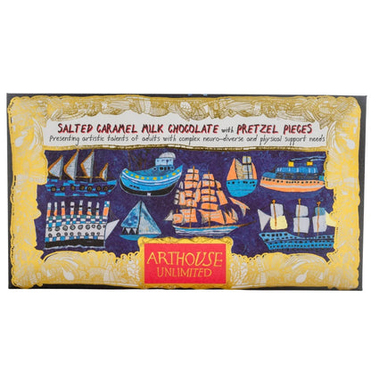 Arthouse Unlimited salted caramel milk chocolate with pretzel pieces, in packaging with ships
