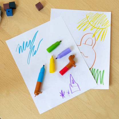 Rainbow dachshund markers on paper with drawings