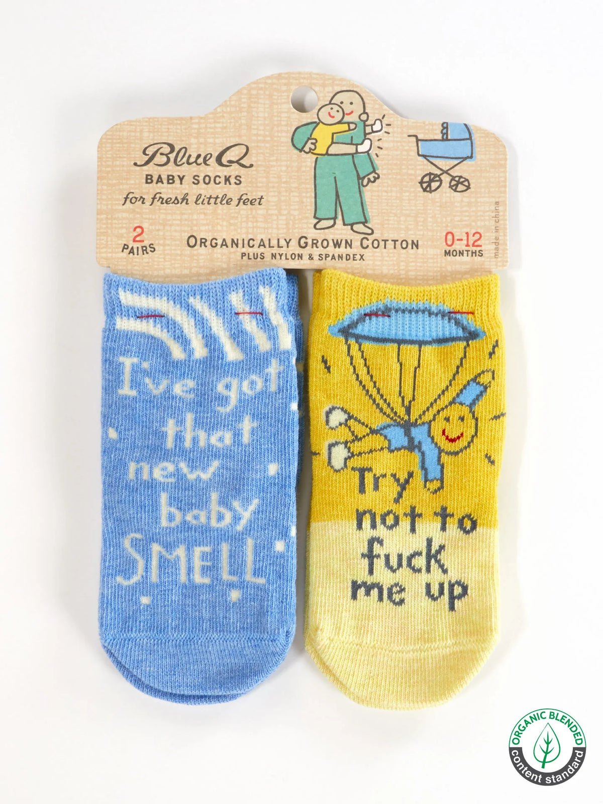 Two pairs of baby socks in packaging: I've got that new baby smell, and Try not to fuck me up