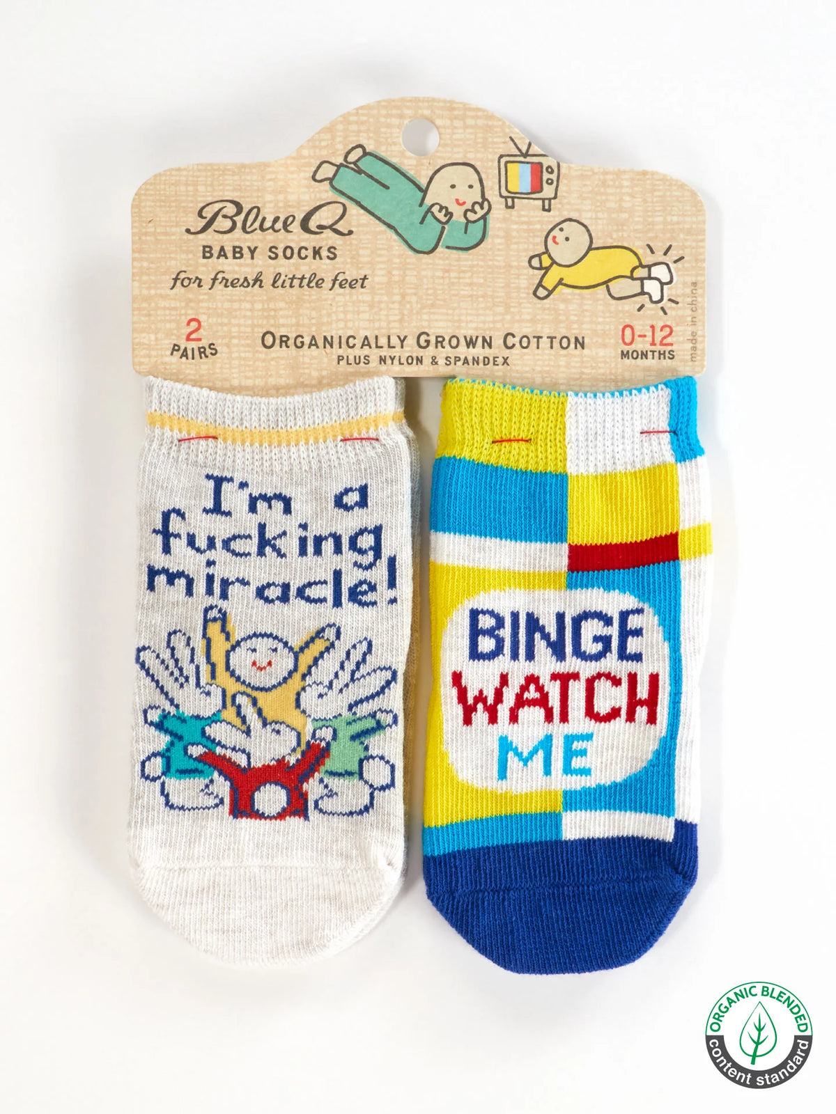 Two pairs of baby socks in packaging: I'm a fucking miracle!, and Binge watch me