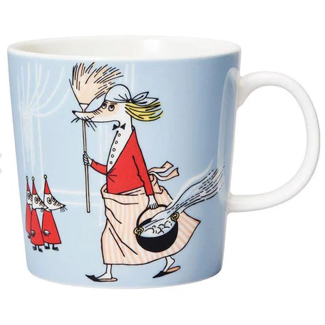 Moomin Fillyjonk mug: Fillyjonk sweeping with a broom, with little creatures in red hats, on pale blue
