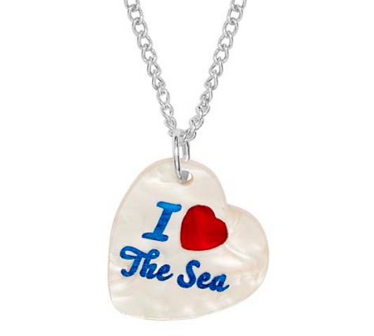 Tatty Devine pearly white heart pendant reading 'I ♥ the sea'
