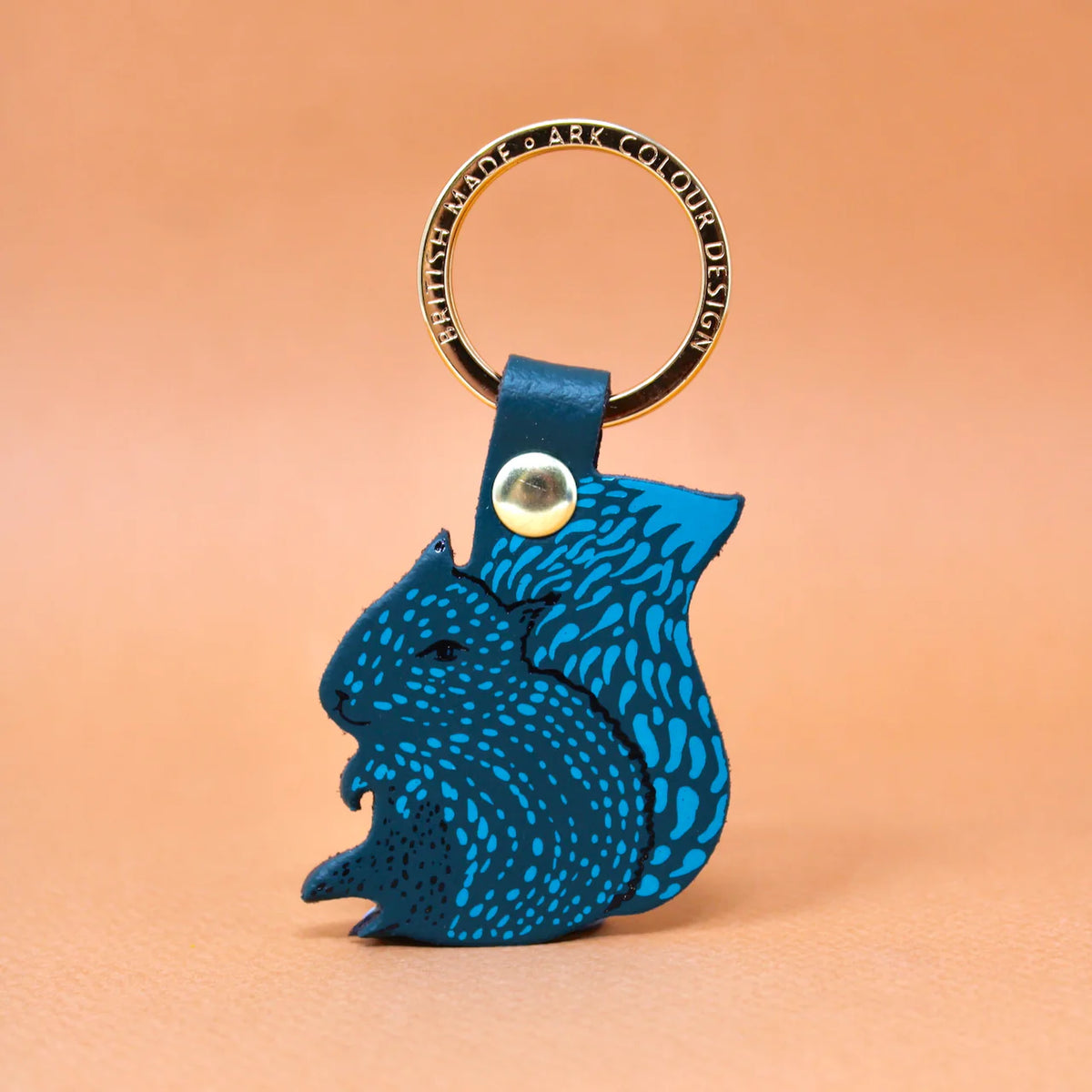 Ark teal blue leather squirrel key ring with a gold ring