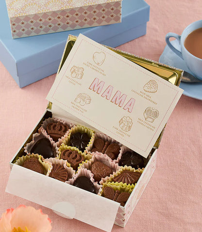 Mama tin open, showing an assortment of chocolates