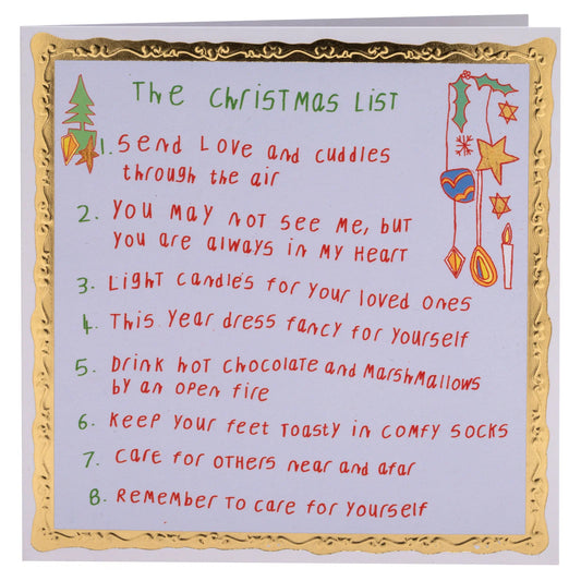 Arthouse Christmas card: a handwritten 'Christmas list' of kind wishes in a gold border, like 'Light candles for your loved ones' and 'Keep your feet toasty in comfy socks'