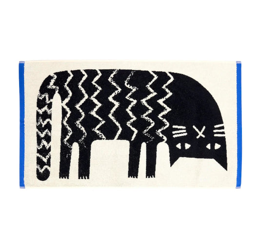 Cream hand towel with a stretched-out black cat and blue edges