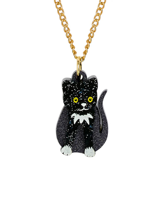 Tatty Devine toy cat pendant: a black glitter cat with yellow eyes on a gold chain