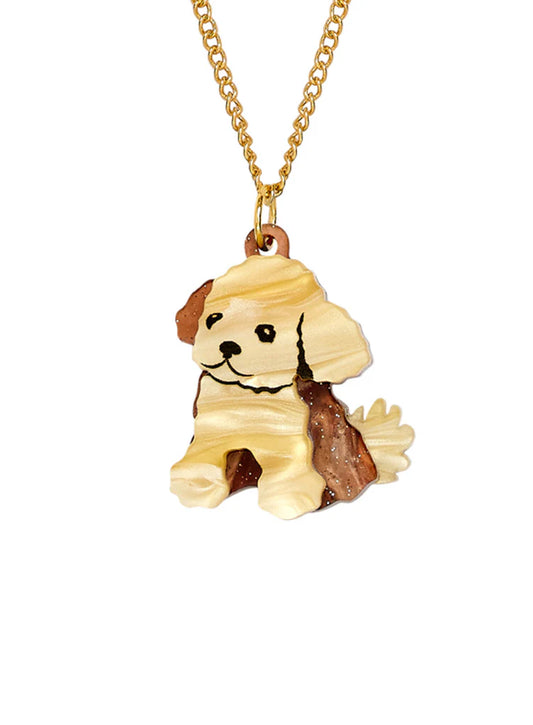 Tatty Devine toy dog pendant: a cream and brown puppy on a gold chain
