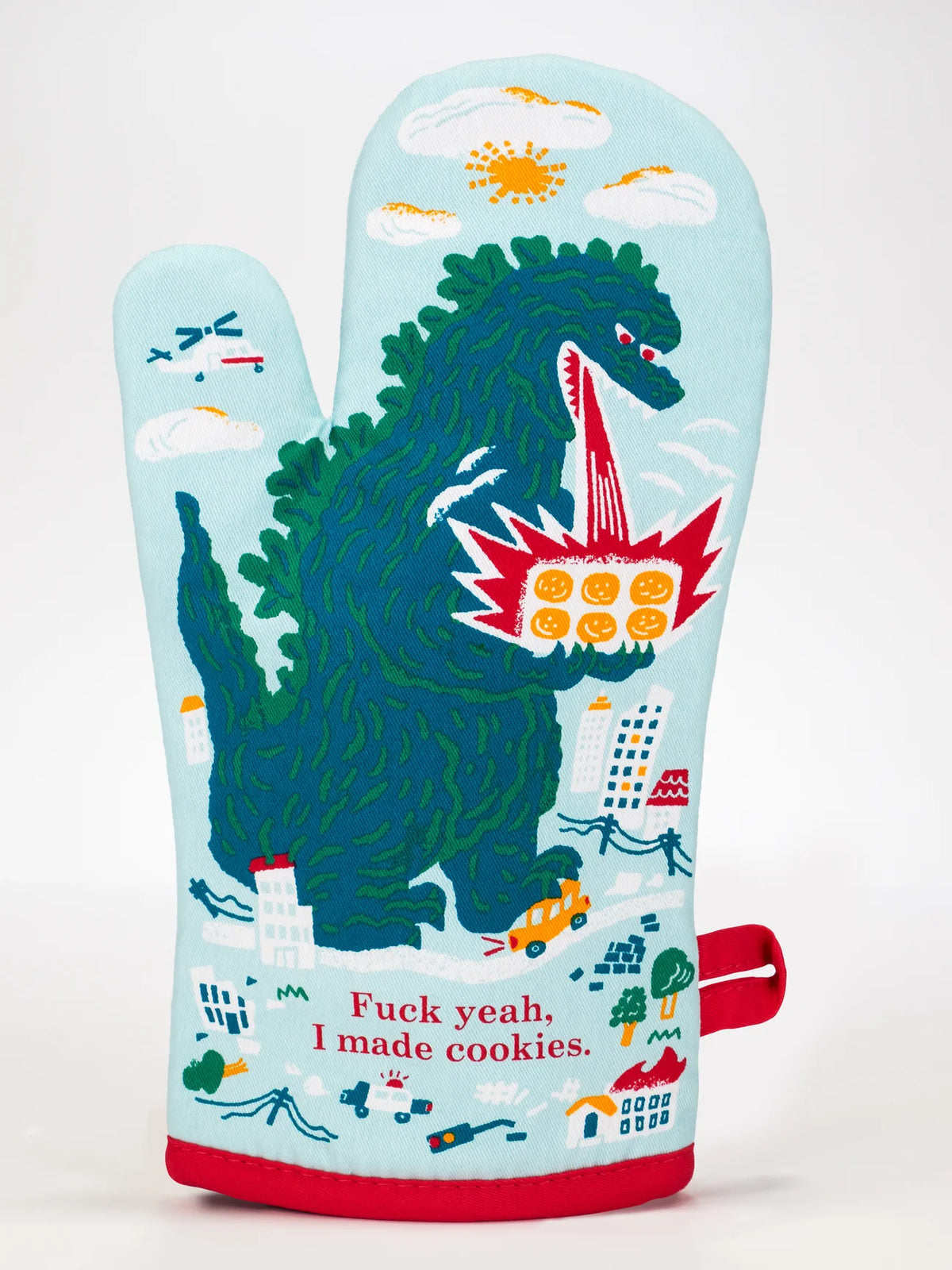 Back of the oven mitt: the dinosaur breathing fire at cookies, with 'Fuck yeah, I made cookies'