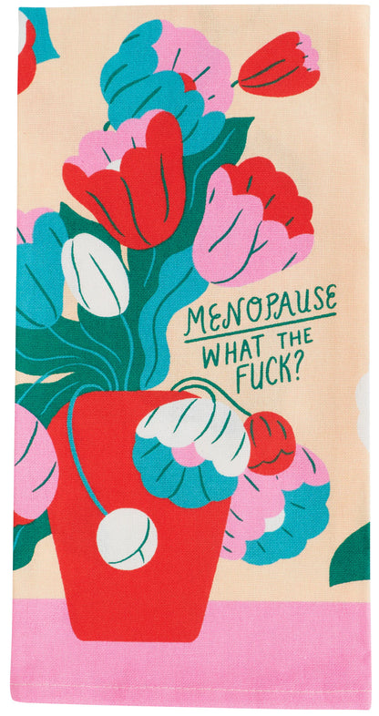 Blue Q tea towel, folded: pink and red flowers in a red pot, with 'Menopause what the fuck?'