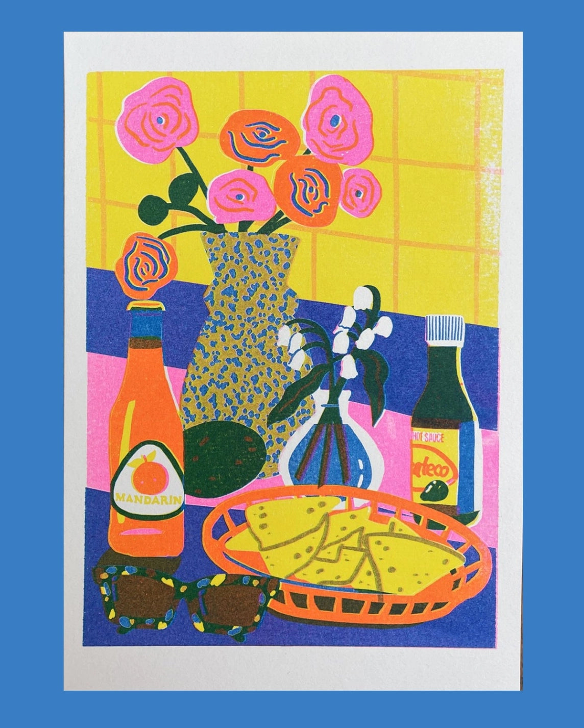 Naomi Wilkinson A5 mini print: a still life of flowers in a patterned vase, bottles and sunglasses