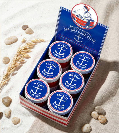 Sea salt hand salve display box on sand