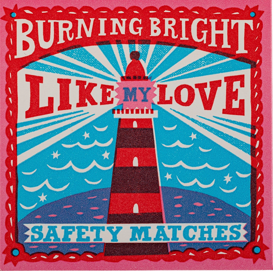 Archivist matchbox: a red and white lighthouse with 'Burning bright like my love – safety matches'