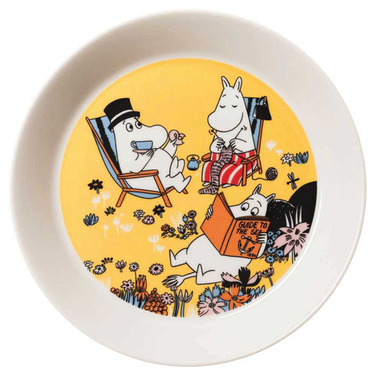 Yellow Moomin 80 Family Time plate with the Moomin family relaxing in deckchairs