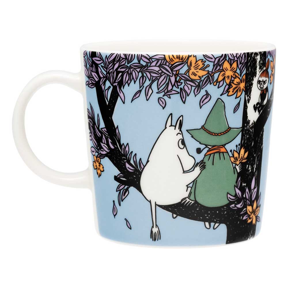 Other side of the mug with Moomintroll and Snufkin on a branch