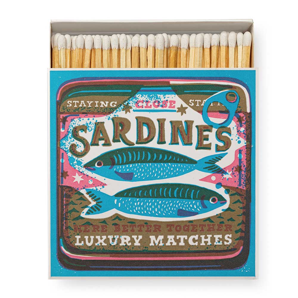 Square box of luxury matches printed like a sardine tin: Sardines