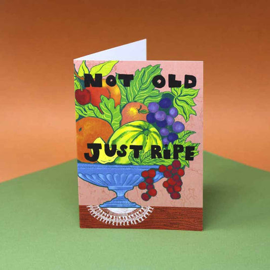 Card with a bowl of fruit and grapes: Not old just ripe