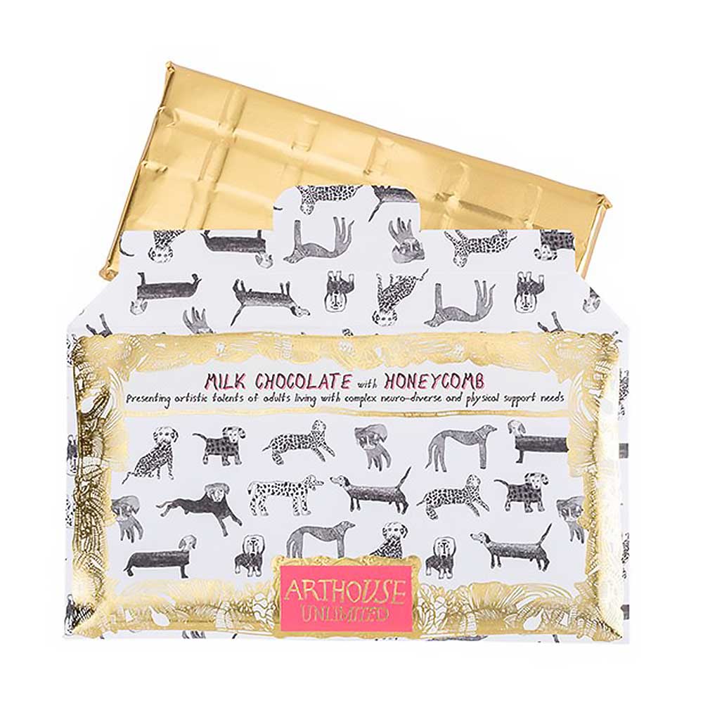 Arthouse Unlimited milk chocolate with honeycomb bar with a black and white dog wrapper and gold foil