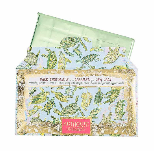Arthouse Unlimited dark chocolate with caramel and sea salt bar in a turtle-print wrapper with green foil