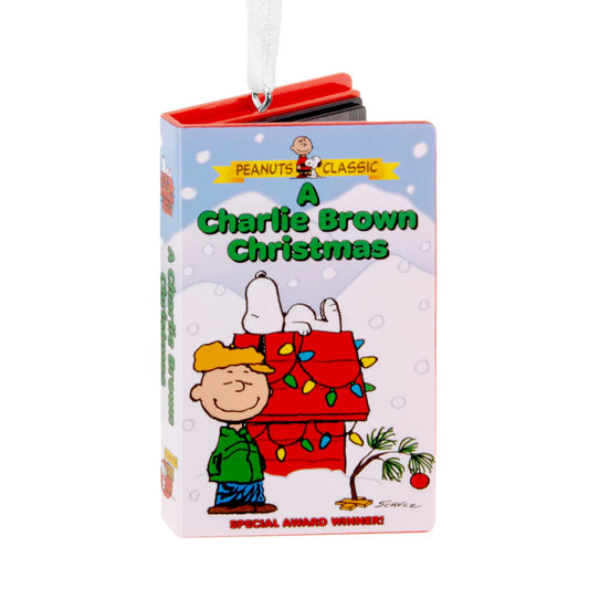Peanuts Christmas decoration shaped like an A Charlie Brown Christmas VHS tape case