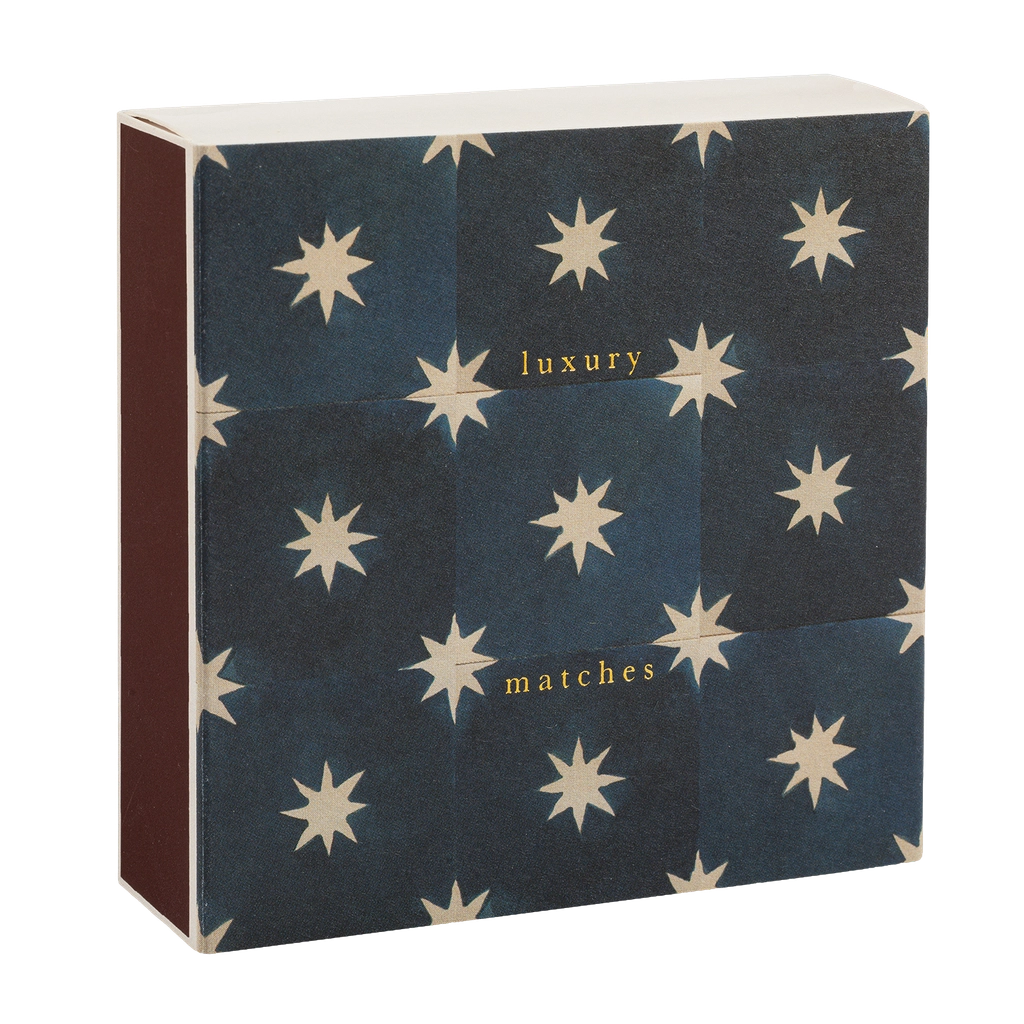 Navy star tile matchbox at an angle