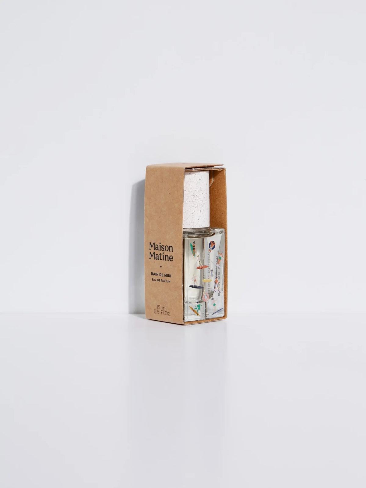 Bain de Midi perfume beside its kraft box