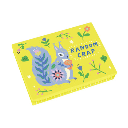Blue Q yellow pocket box: a squirrel with 'Random crap'