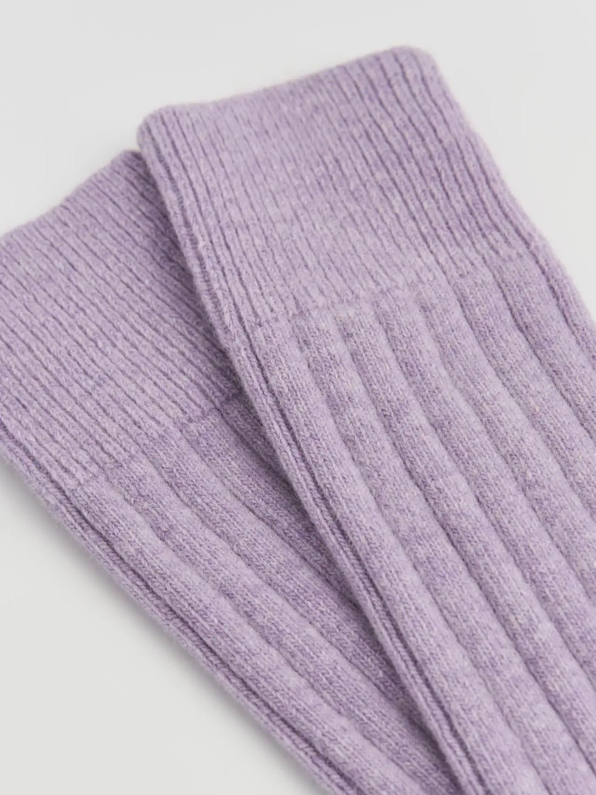 Close-up of the ribbed parma violet merino knit