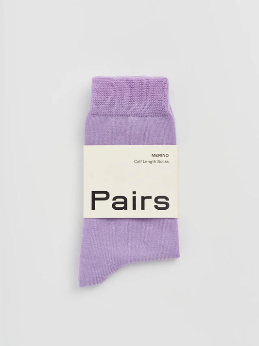 Pairs merino calf socks in parma violet, medium, with a Pairs paper band