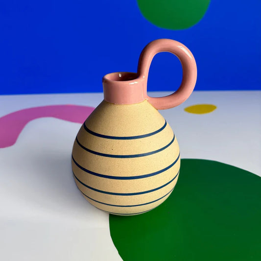 Bloc bud vase in cream with blue stripes and a pink loop handle