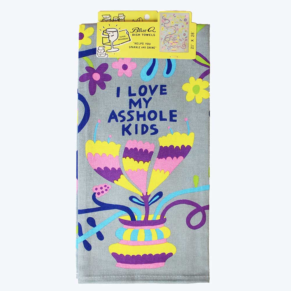Folded asshole kids tea towel in its packaging