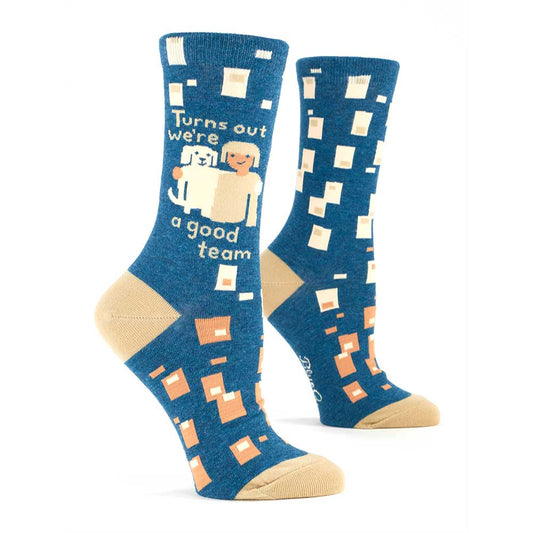 Blue women's socks with a person and dog among squares: Turns out we're a good team