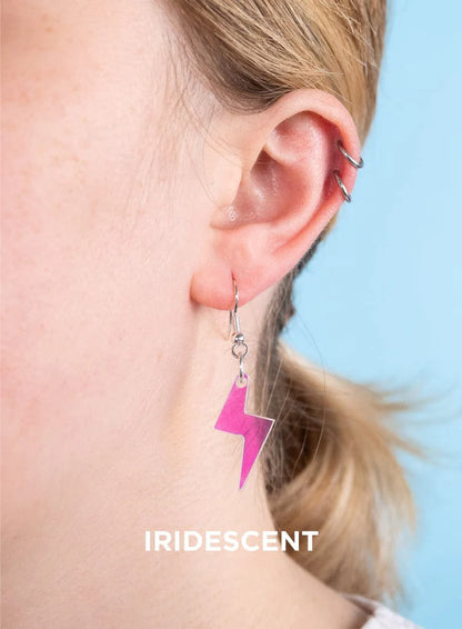 Iridescent bolt earring worn