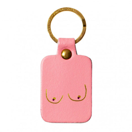 Ark pink leather key fob with a gold line drawing of boobs
