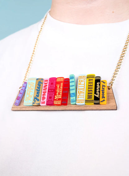 Bookshelf necklace worn with a white top